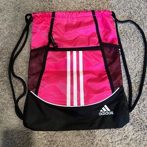 Adidas collapsible backpack with front zip pocket & drawstring to close the bag